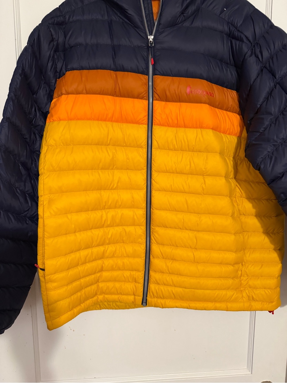 cotopaxi Colorblock Puffer Jacket in Navy, Orange & Yellow